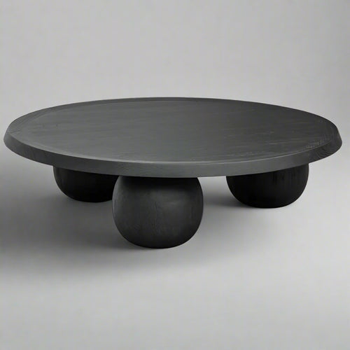Orvara Black Wooden Round Coffee Table – angled view