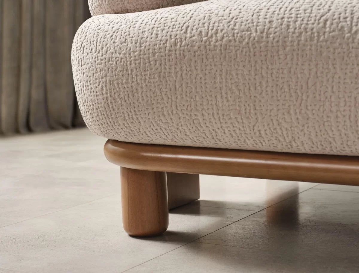 Arwin Beige Boucle Sofa – close-up of the solid wood base and leg