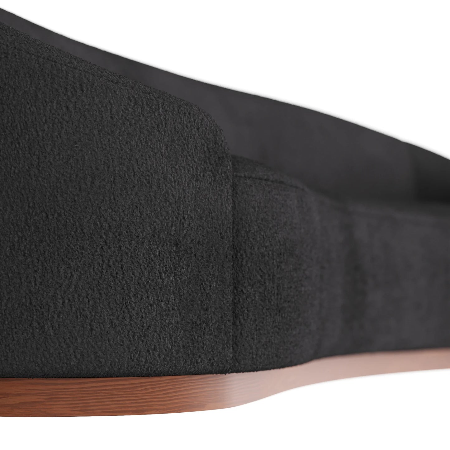 Angled shot of Langford Sofa in charcoal fabric, highlighting soft boucle texture and oak base