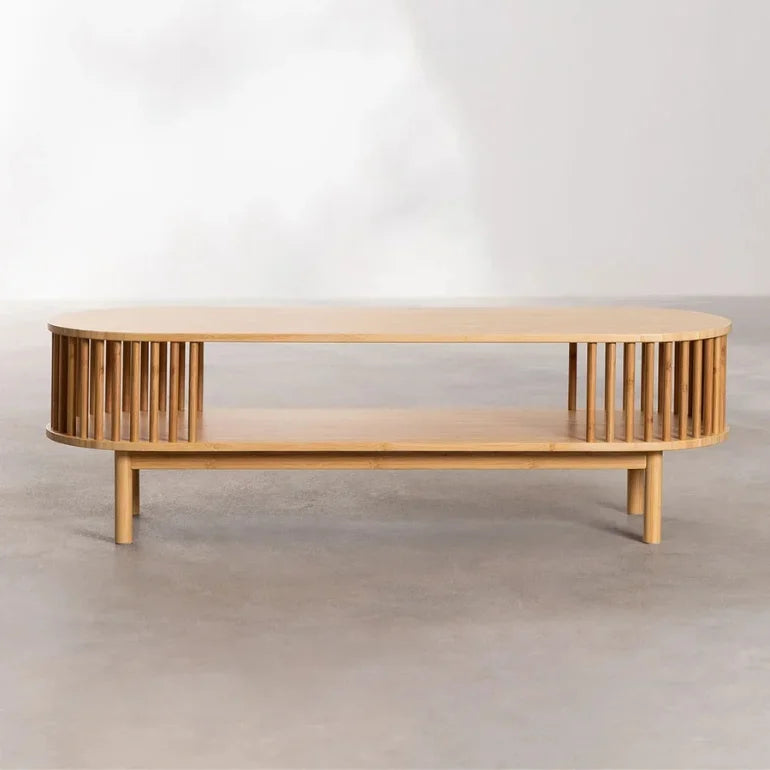 Front view of Nuvira coffee table with curved solid wood frame and open leg design – organic modern style