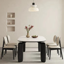Switch Black Selva chair placed beside a dining table 3 image