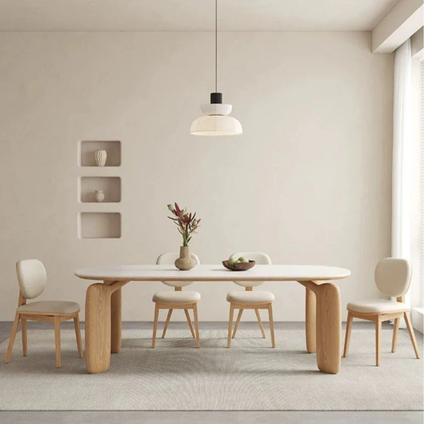 Natural color Selva chairs placed beside a dining table