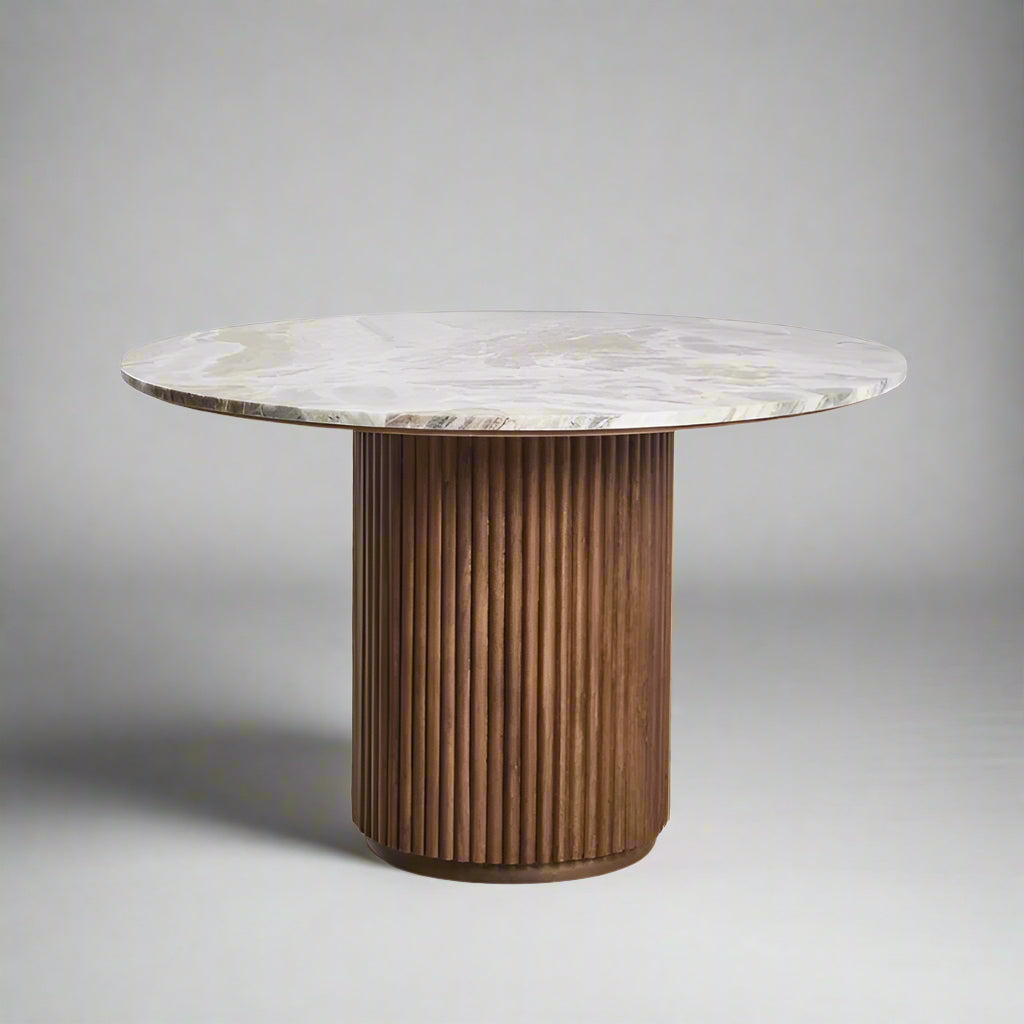 Front view of Vittoro round marble dining table with solid wood pedestal base – luxury dining furniture