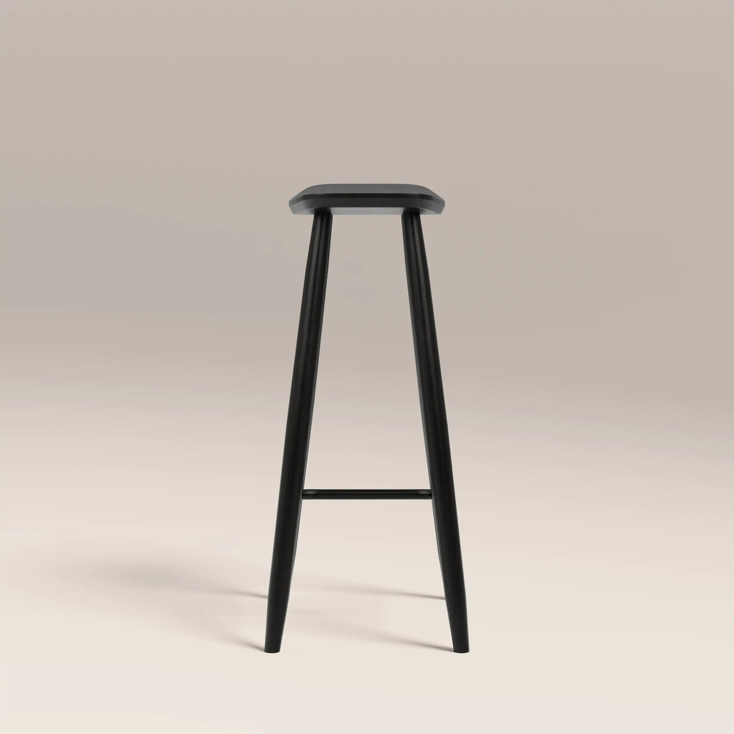 Nora Bar Stool in black, angled view