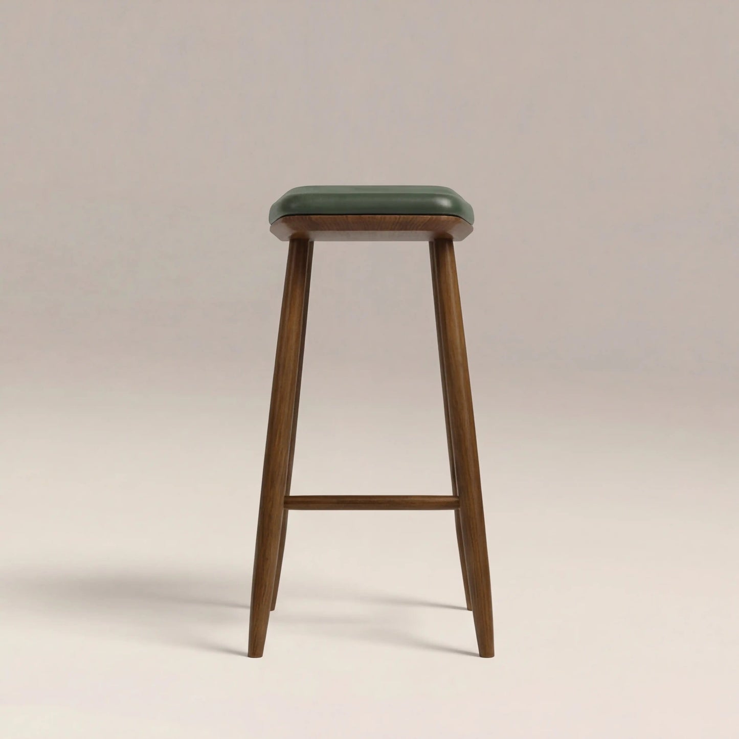 Nora Bar Stool in green, angled view