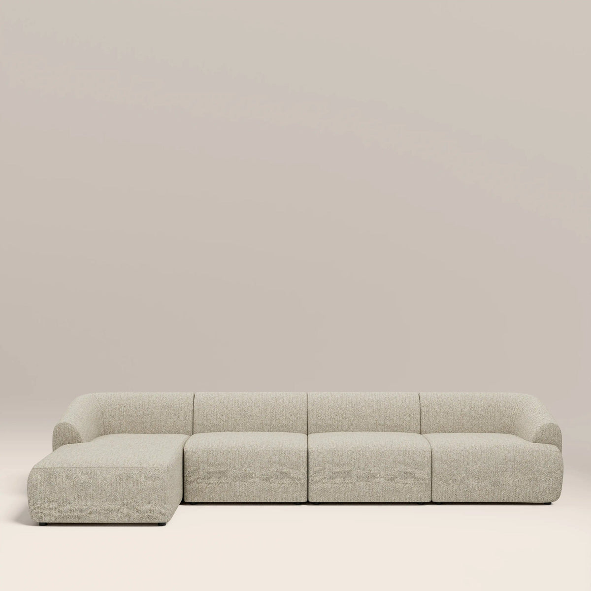 Cream 4 seater chaise sofa with left facing chaise