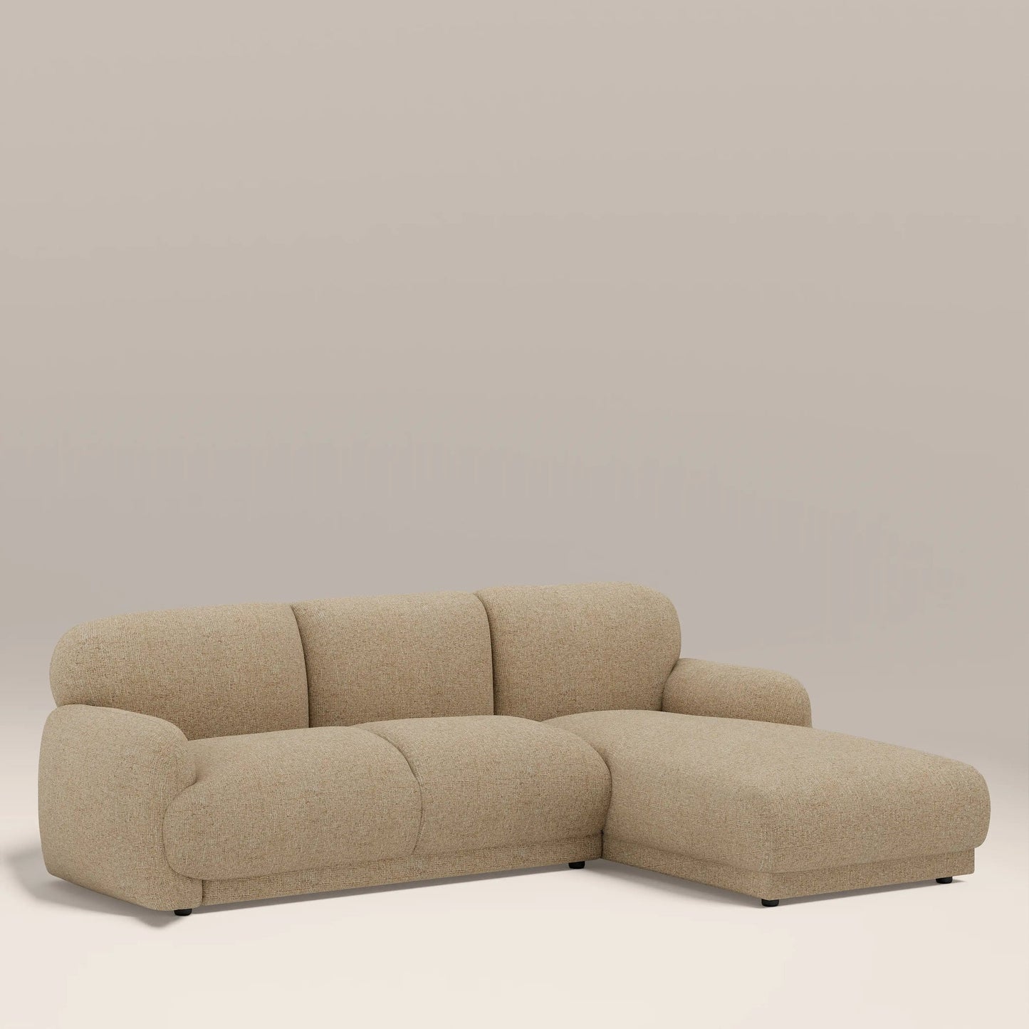 Sana L-shape chaise sofa in beige boucle, angled view