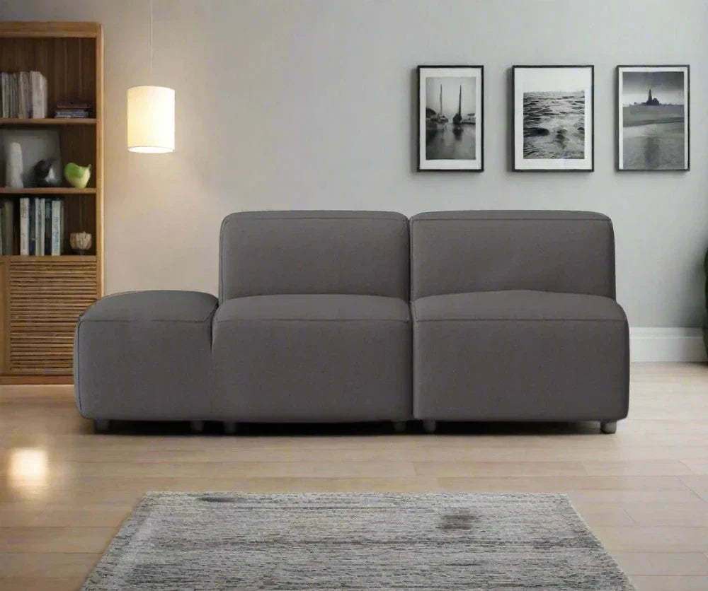 Harbor Dark Grey 4 Seater Fabric Sofa styled in a living room